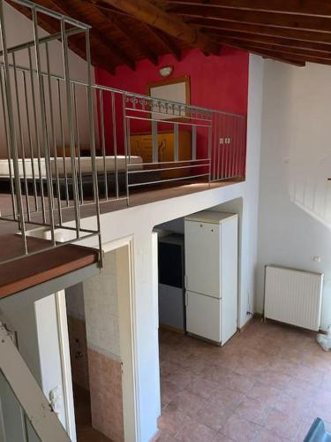 a room with a staircase and a roomasteryasteryasteryasteryasteryasteryasteryastery at Μεζονέτα AIKATERINI N 9 in Chios