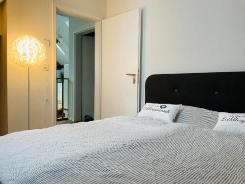 Ένα ή περισσότερα κρεβάτια σε δωμάτιο στο Appartement Villa Seeliebe