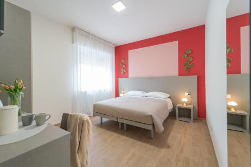 Postel nebo postele na pokoji v ubytování Residence Casadì