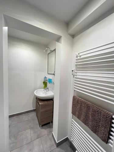 a bathroom with a sink and a mirror at Elpe in Olsberg