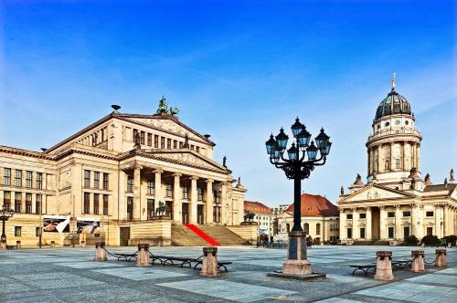 a large building with a street light in front of it at Great central premium 1 BR apartment in best area 10117 Berlin Mitte, Leipziger Straße in Berlin