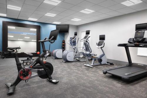 a gym with several exercise equipment in a room at Hampton Inn & Suites El Paso/East in El Paso