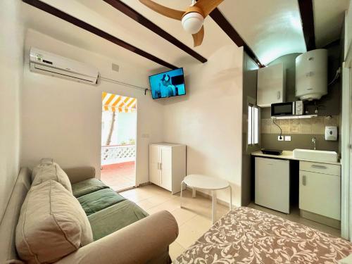 Køkken eller tekøkken på Nuevos Apartamentos frente al mar y a la playa