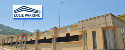 a building with a sign that reads cubic parking at "Sweet Life" Casa Vacanze in Lipari