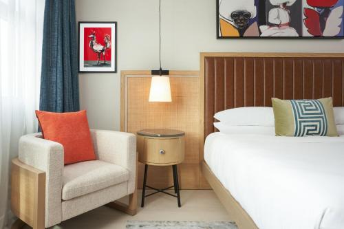 Postel nebo postele na pokoji v ubytování Hotel Rumbao, a Tribute Portfolio Hotel