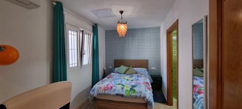 Postelja oz. postelje v sobi nastanitve Stylish apartments near the beach, Chilches Coast
