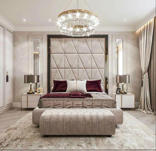 Giường trong phòng chung tại Vip Apartment Baku palace