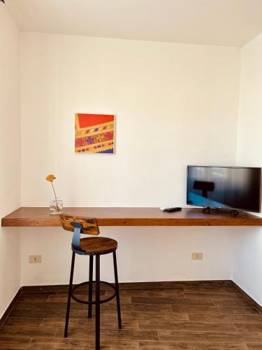Μια τηλεόραση ή/και κέντρο ψυχαγωγίας στο Carrales Guest House