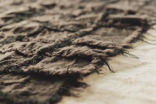 a close up of a pile of hair on a table at Une stay&diner in Sasayama
