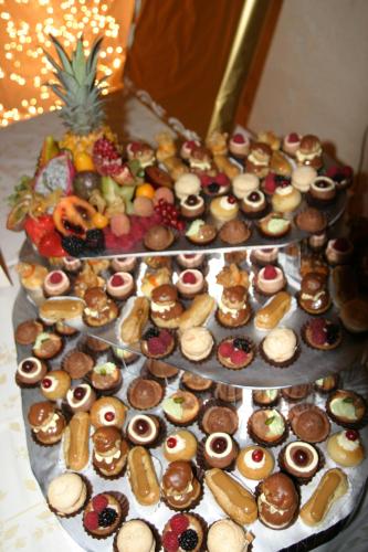 a display of different types of pastries on a table at Château des Monthairons Hôtel Restaurant GastroMaison Spa privatif in Les Monthairons
