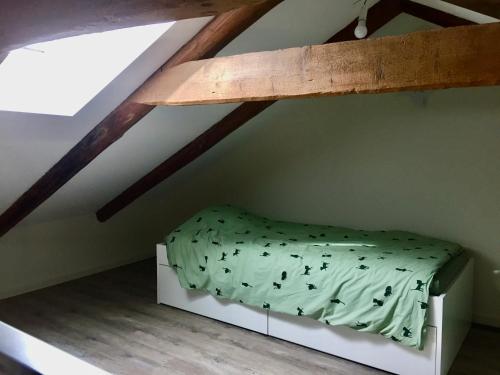 Postel nebo postele na pokoji v ubytování Gîte Jules Romains