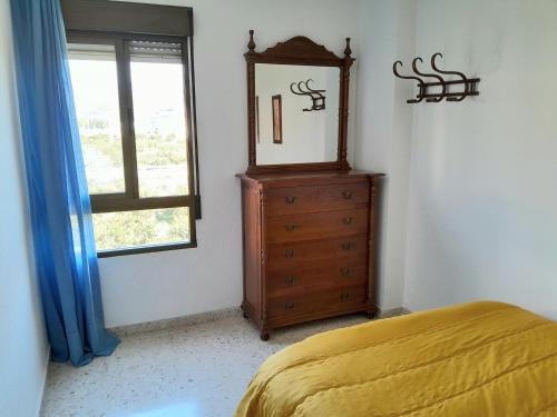 Postel nebo postele na pokoji v ubytování Casa Adriana con parking Room in shared apartment