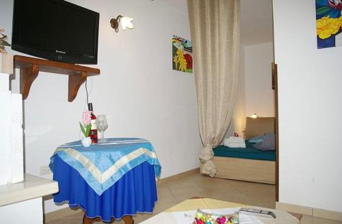 Een bed of bedden in een kamer bij Casa Vacanze Gallipoli Città Bella
