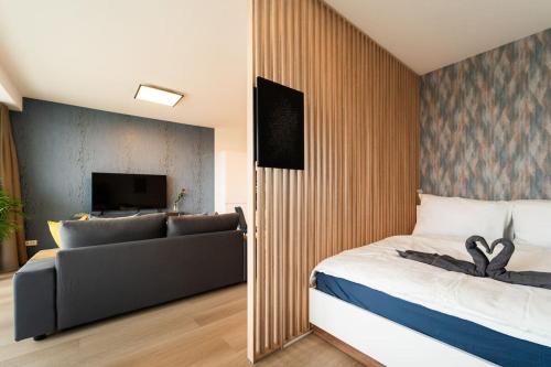 Postel nebo postele na pokoji v ubytování InSady - Studio in Brno-Center