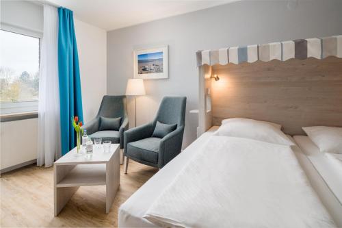 Katil atau katil-katil dalam bilik di Stadthotel Eckernförde