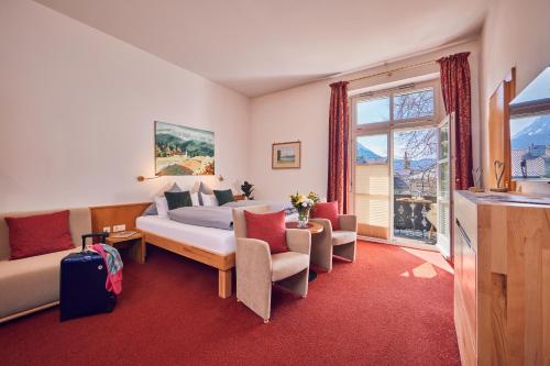 Postel nebo postele na pokoji v ubytování Hotel Aschenbrenner