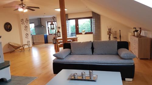 Ruang duduk di Ferienwohnung Obertshauser