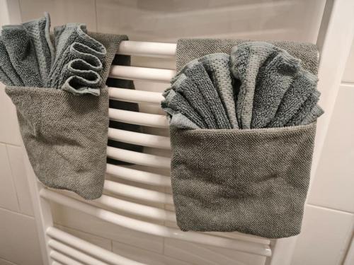 two towels on a towel rack in a bathroom at 3 Zimmer Ferienwohnung 80qm in Bamberg