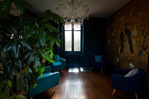 Ruang duduk di Le Jardin, chambres d'hôtes en Baie de Somme