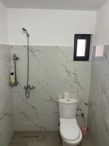 Ένα μπάνιο στο Guesthouse Kroi City Center