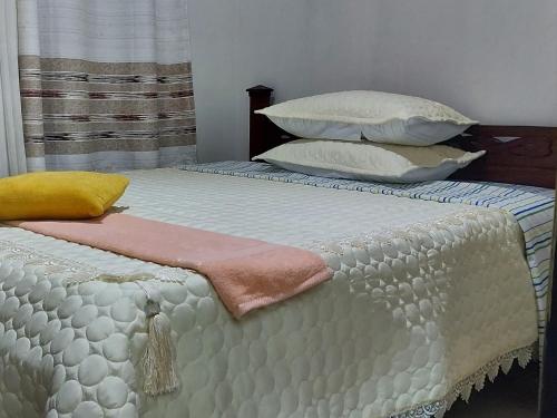 Postel nebo postele na pokoji v ubytování Kigali st Therese4