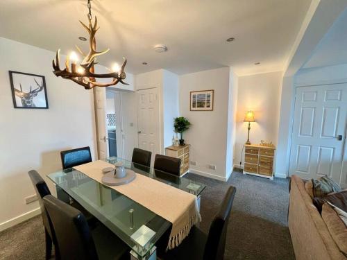 Μια τηλεόραση ή/και κέντρο ψυχαγωγίας στο Bay View Apartment