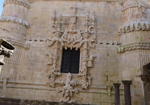 a window on the side of a building at Hotel Dom Goncalo & Spa in Fátima