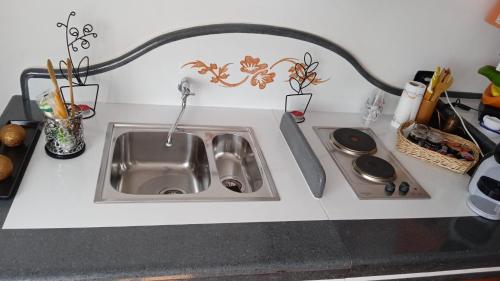 Dapur atau dapur kecil di Capri Sky Loft