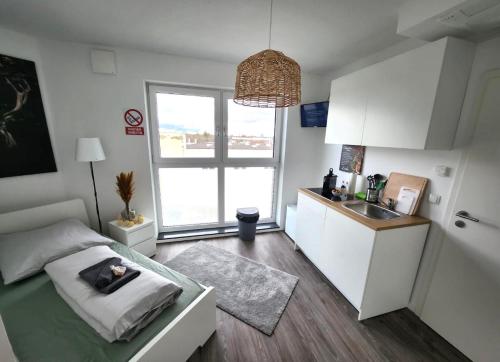 Dapur atau dapur kecil di Modernes Apartment mit WIFI, Aufzug & Kostenlos Parken EL-Living