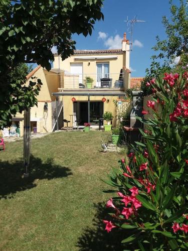 Maison de 120 m², divisée en 2 appartements indépendants