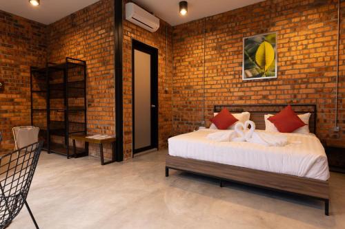 Postel nebo postele na pokoji v ubytování Sebayu Retreat Gopeng