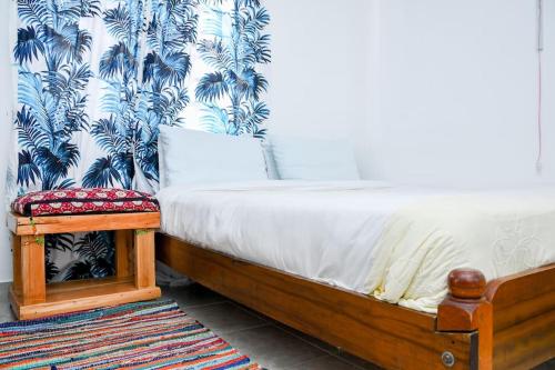 מיטה או מיטות בחדר ב-Familia@HeArt
