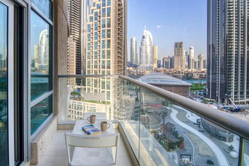 a balcony with a view of the city at The Lofts - Luxurious space with Burj Khalifa View in Dubai