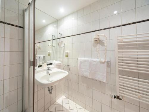 Vannituba majutusasutuses B&B HOTEL Gotha-Hbf