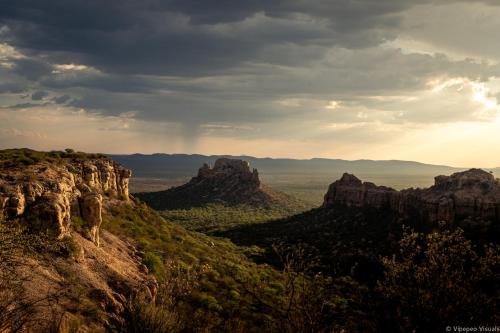 a view of the grand canyon under a cloudy sky at Munsterland Guest Farm in Outjo