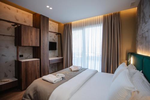 Cama o camas de una habitación en Hotel Flaer