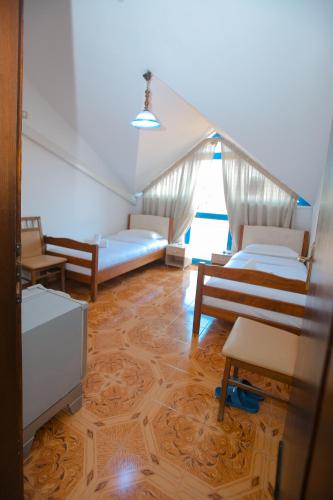 Postel nebo postele na pokoji v ubytování Hotel Ambasador