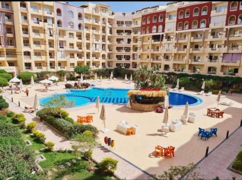 Bazén v ubytování Sunny studio with 3 swimming pools Florenza Hurghada nebo v jeho okolí