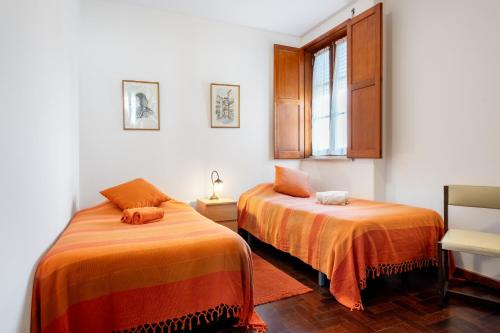 Postel nebo postele na pokoji v ubytování Vivenda MiraSerra