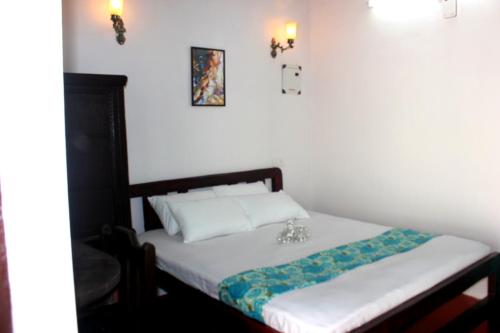 Katil atau katil-katil dalam bilik di Villa Khatun Guesthouse