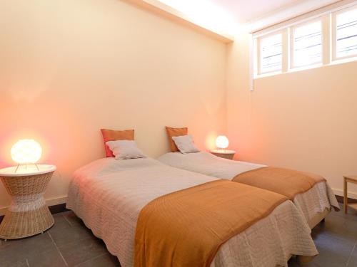 A bed or beds in a room at FLH Boavista House of Music with Private Garden