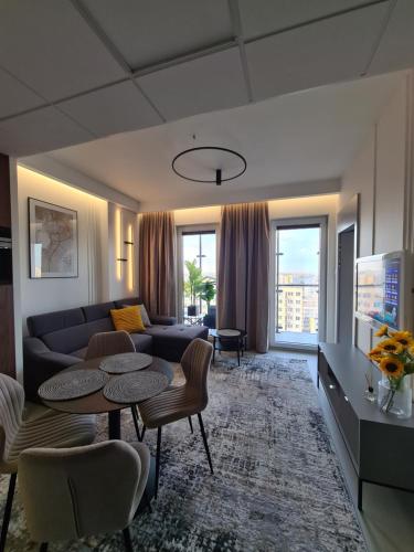 Posedenie v ubytovaní Luksusowy Apartament Bliska Wola SABA