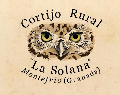 an owl with yellow eyes and the words cornicula rural la salida m at Cortijo La Solana Montefrío in Montefrío