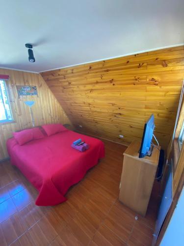 Ein Bett oder Betten in einem Zimmer der Unterkunft Lilafken Apart Pichilemu