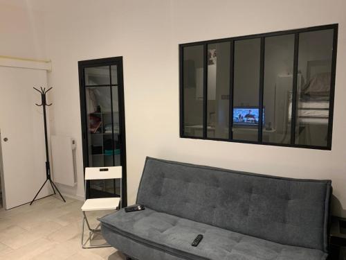 Χώρος καθιστικού στο Petit pavillon individuel f2