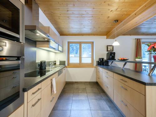 Kuchyň nebo kuchyňský kout v ubytování Chalet Peter