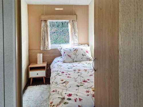 Ένα ή περισσότερα κρεβάτια σε δωμάτιο στο Glen Y Nant