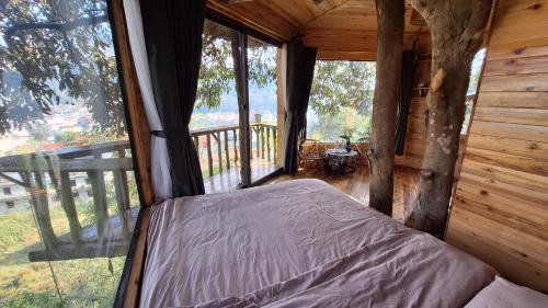 Giường trong phòng chung tại Sapa Jungle Homestay