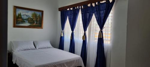 Кровать или кровати в номере La Milagrosa