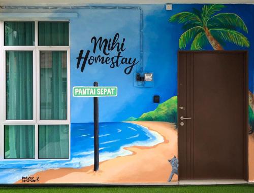 a wall with a mural of a beach and a palm tree at MIHI Homestay Pantai Sepat in Kuantan